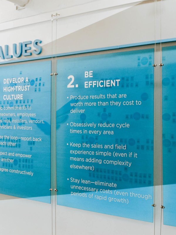 Blue Raven Solar values presented on the wall located at headquarters in Orem, UT