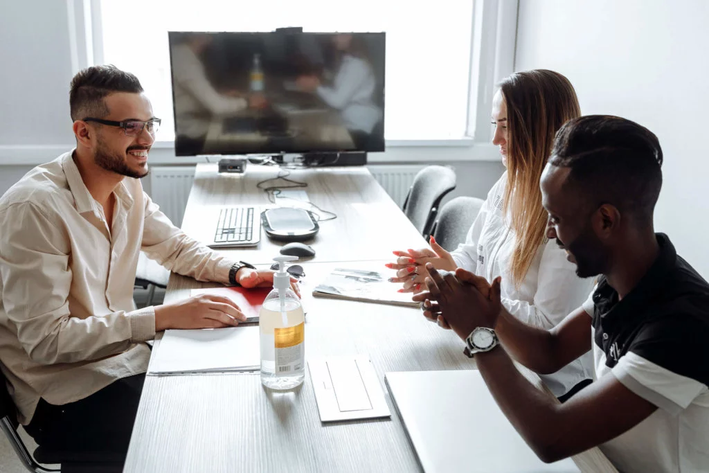 Three-Employees-Collaborating-Together