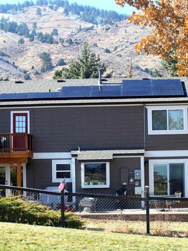 residential solar panels on brown house