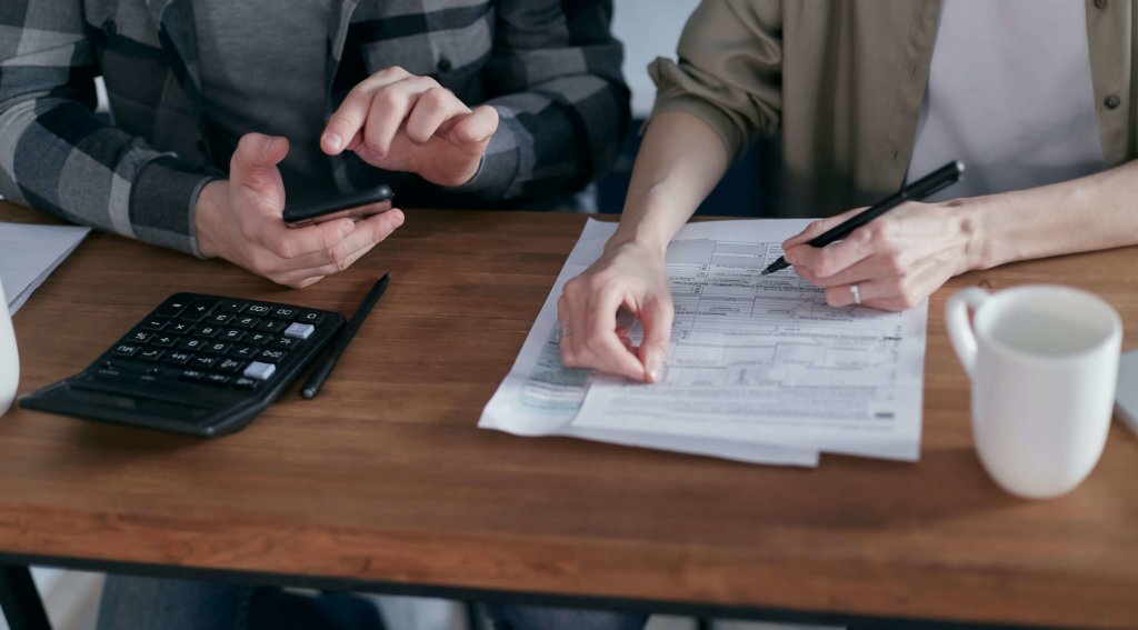 A couple figuring out and filing taxes together