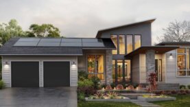 Modern house with grey rock and panelling exterior and large windows rendering