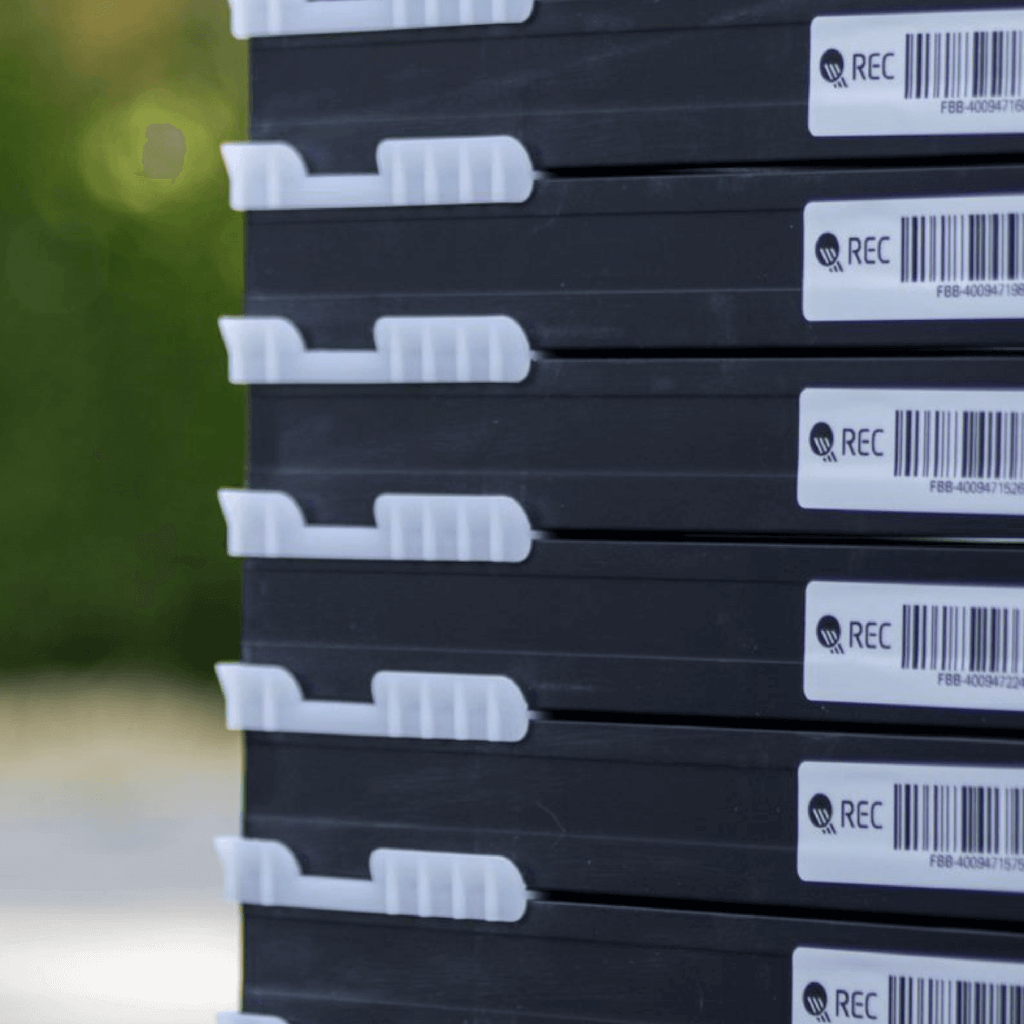 Stacked solar panels, prior to installation, with plastic separators