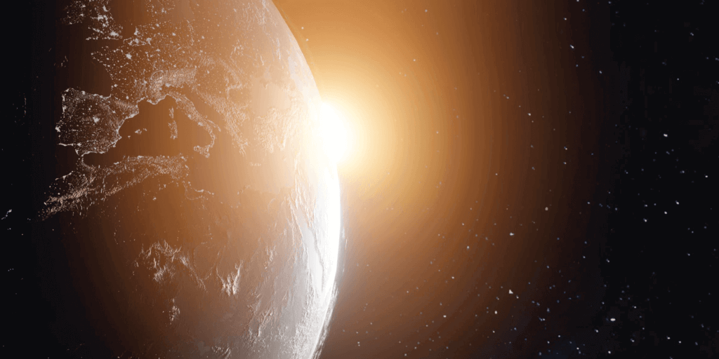 Earth with the sun peaking through behind
