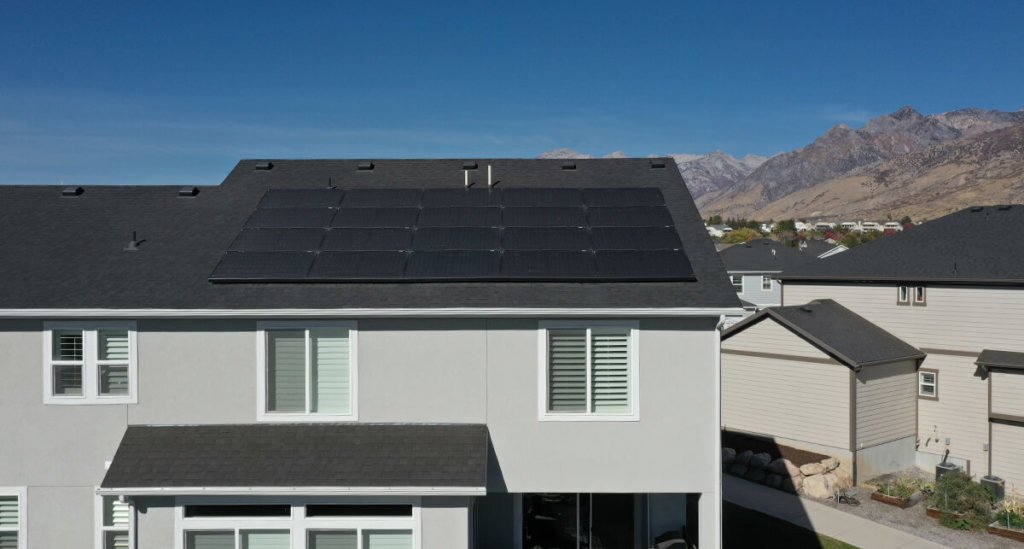 Final Shot Blue Raven Solar customized solar panel installation on rear of house in perfect grid