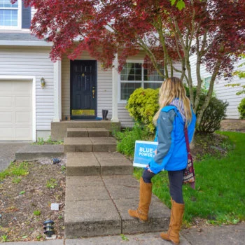 20 copy-2 Blue Raven Solar salesperson walking to a home