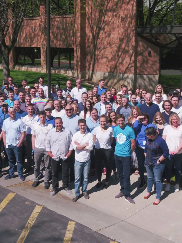 Blue Raven Solar employees standing in front of the corporate office in Orem, Utah