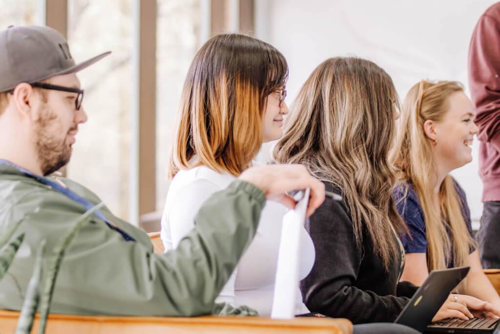 Row-of-Blue-Raven-Solar-Employees-Sitting-Together