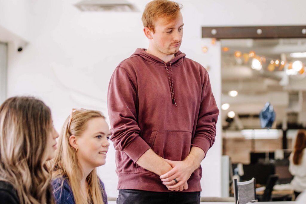 Three-Blue-Raven-Solar-Employees-in-the-Corporate-Lobby