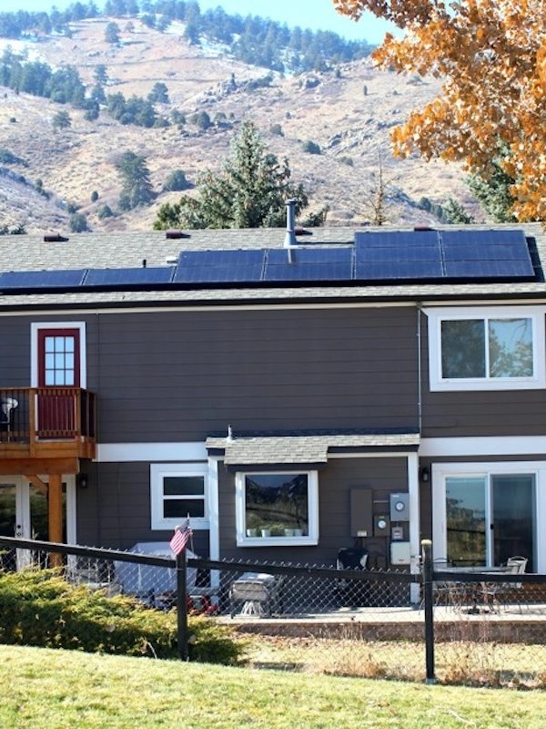residential solar panels on brown house
