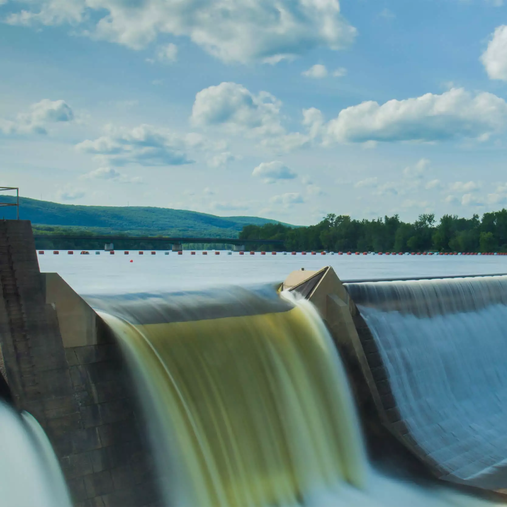 Hydropower representation through wall of dam reservoir