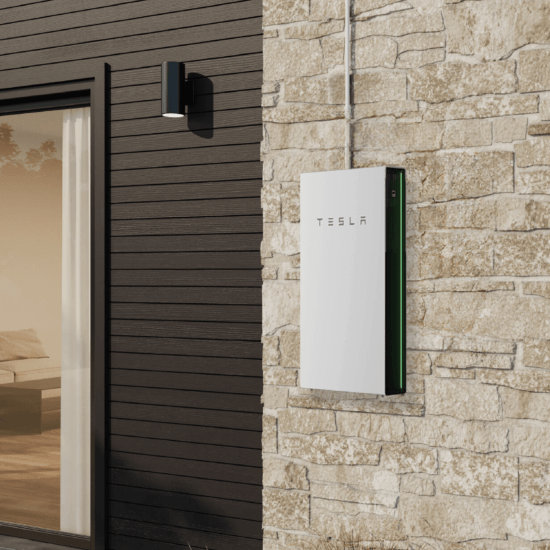 Rendering of a Tesla Powerwall battery on a modern, neutral house