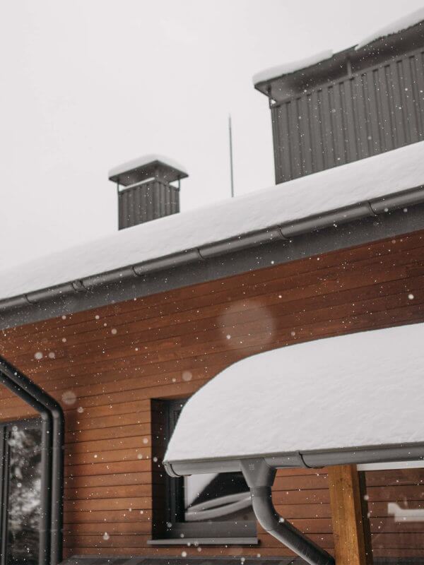 Roofline with large amounts of snowfall piled up