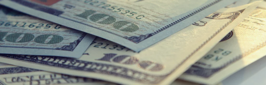 money Stacked $100 bills solar savings