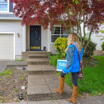 20 copy-2 Blue Raven Solar salesperson walking to a home