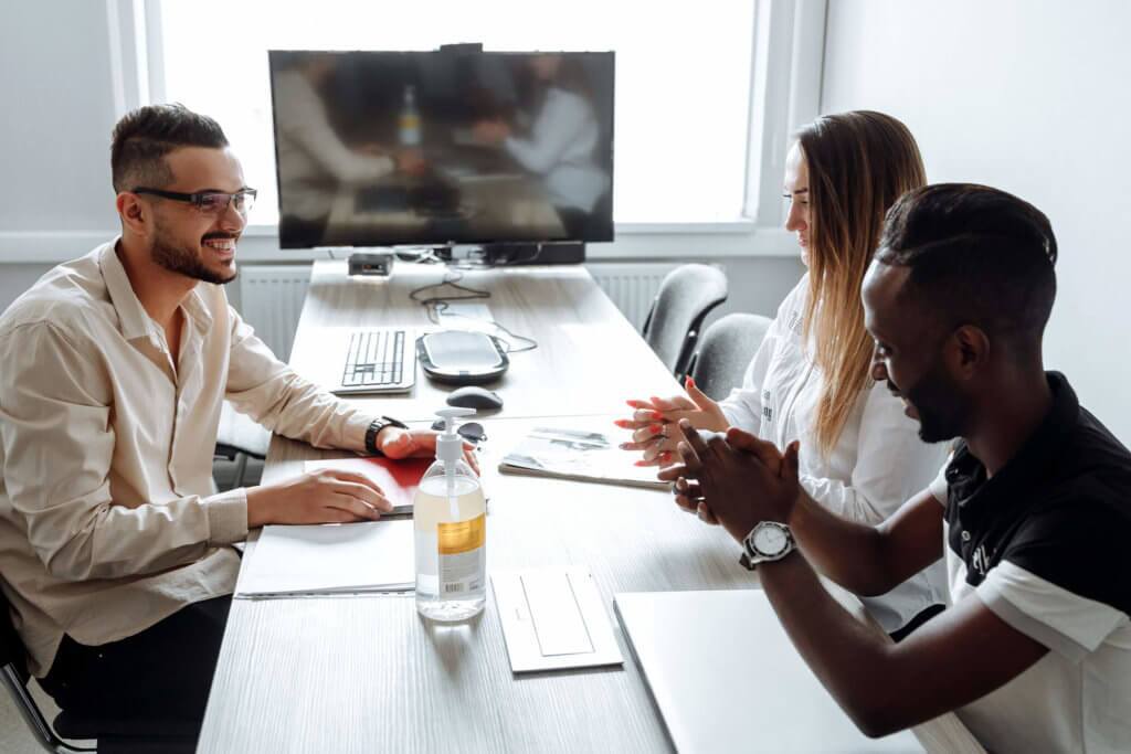 Three-Employees-Collaborating-Together