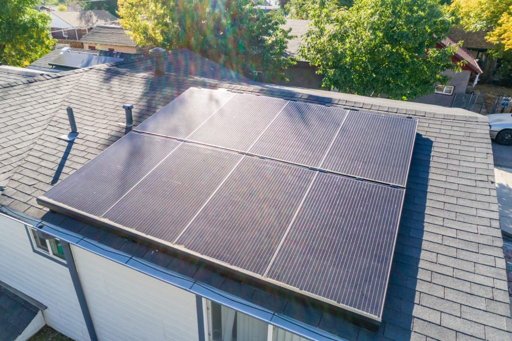 Up close view of 8-panel solar system on roof