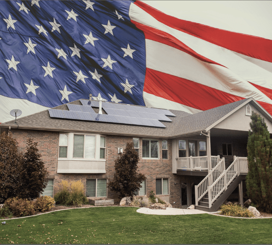 American flag and house with solar panels