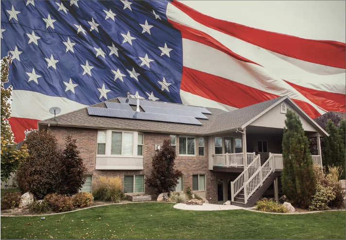 4ofjuly American flag and house with solar panels
