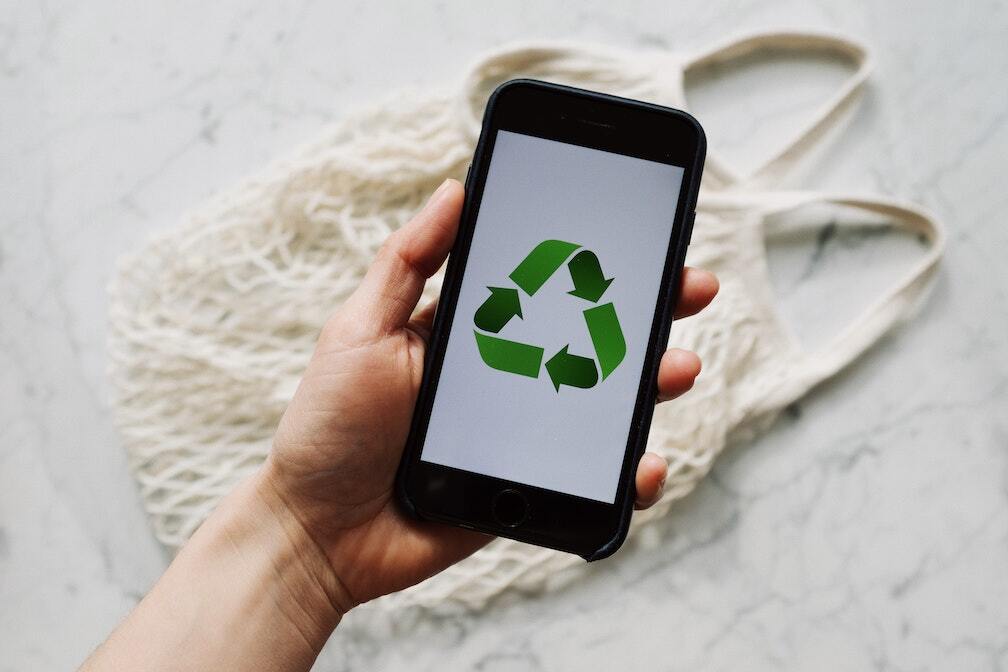 pexels-ready-made-3850587 Recycle logo on Phone