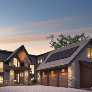 Grey brick and stone house rendering with large 3-car garage and solar panels installed on roof