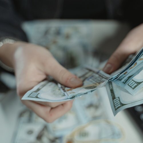 Hundred-Dollar-Bills Hands holding and fanning out hundred dollar bills