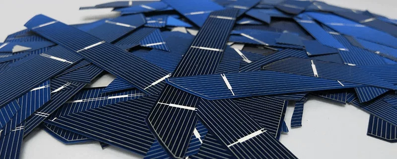Solar Cells Various solar cells in a pile, some black and some blue in hue