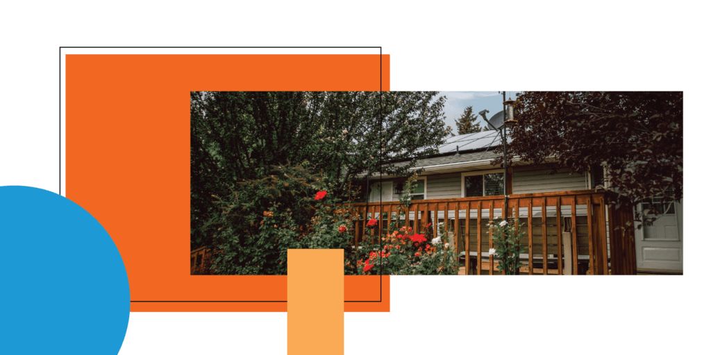 The back of a house with wood deck during spring time, surrounded by bright colored shapes and outlines