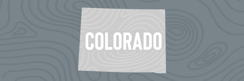 Silhouette of Colorado state in various shades of grey