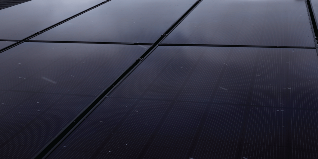 Are Solar Panels Waterproof-01 Array of solar panels, black-on-black design