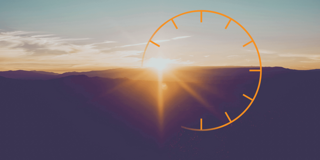 What Does Off-Peak Mean for Solar Panel Owners-01 Sunset with large sun flare and an incomplete thin-line, orange icon similar to a clock