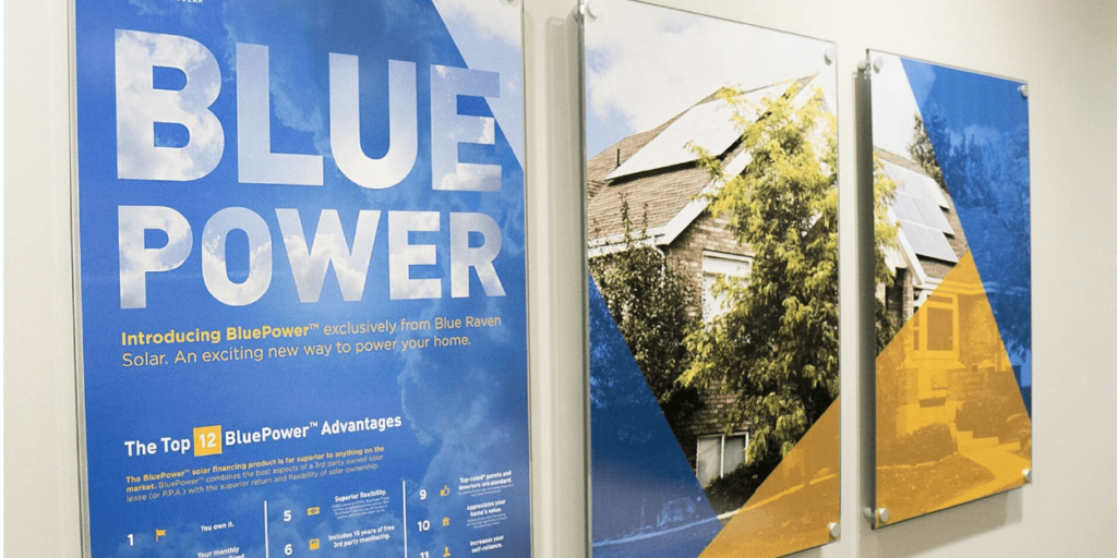 BluePower financing plan featured on wall at Blue Raven Solar headquarters