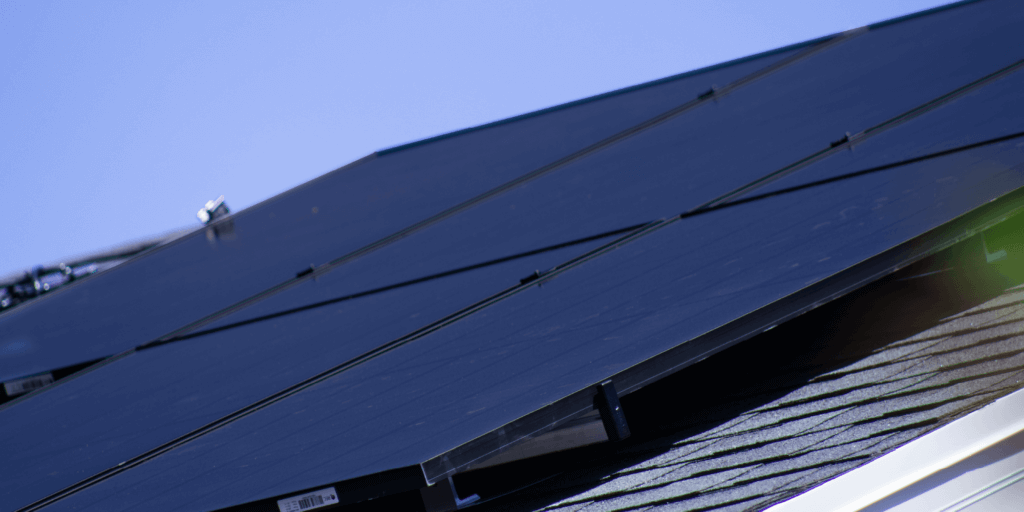 Up close shot of a 6-panel solar system installed on a home